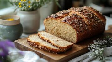 Bread with sesame seeds on a cutting board photo
