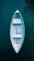 An empty boat floating in the water photo
