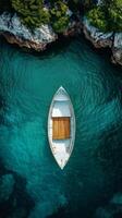 An aerial view of a boat floating in the water photo