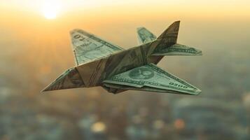 A paper airplane made of money flying over a city photo