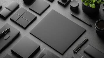 A black desk with various items on it photo