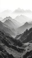 Black and white photograph of mountains in the distance photo