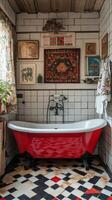 A bathroom with a red bathtub and a black and white checkered floor photo