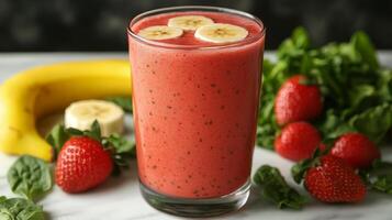 A smoothie with strawberries, bananas and strawberries photo