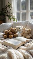 A book and three teddy bears on a bed photo