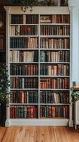 A large bookcase with many books on it photo