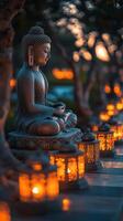 Buddha statue with candles and lanterns photo