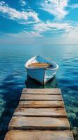 A boat is sitting on a dock in the ocean photo
