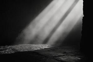 Sunlight shining through a doorway in a dark room photo