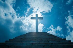 A cross on top of a set of stairs photo