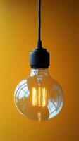 A light bulb hanging from a ceiling photo