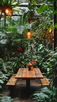 Outdoor dining area surrounded by lush greenery and warm lighting in a tranquil garden setting photo