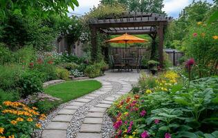 Beautiful garden pathway leading to a cozy seating area under an umbrella in summer photo