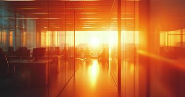 Sunset glow illuminates office space in urban setting during evening hours photo