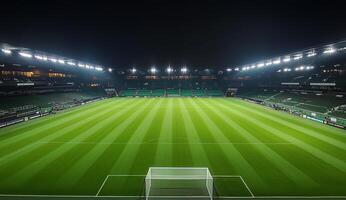 Illuminated football stadium with striped grass field at night before a match photo