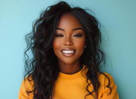 Bright smile of a woman with curly hair against a blue background in a cozy, relaxed setting photo