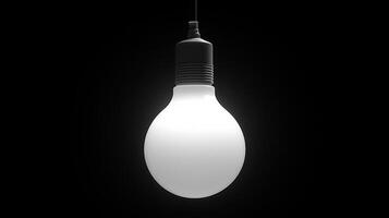 A light bulb hanging from a black background photo