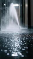 A water spray is coming out of a door photo