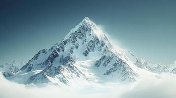 A mountain is shown in the clouds with snow on top photo