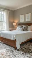 A bed with a white cover photo