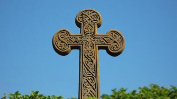 A cross with ornate designs on it photo