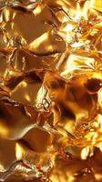 A close up view of wrinkled and reflective golden material photo