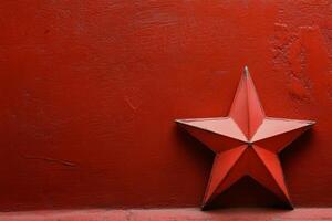 A red star on a red wall photo