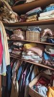 A closet with many clothes and baskets photo