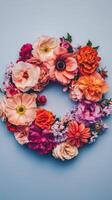 A wreath of flowers arranged in a circle photo