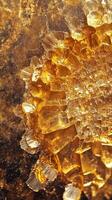 Detailed view of shimmering golden crystals in a mineral formation photo