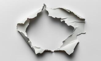 Torn paper revealing blank space, ideal for creative backgrounds and design projects photo