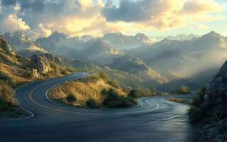 Winding road through majestic mountains at sunset with soft light illuminating the landscape photo