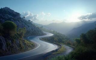 Scenic winding road through mountainous terrain during early morning light photo
