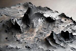 Dark mountainous terrain features jagged peaks and scattered cratering photo