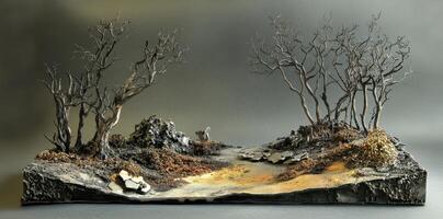 Miniature landscape featuring bare trees with a gray and yellow path photo