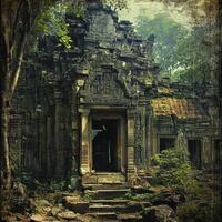 An ancient weathered temple entrance stands in the dense jungle photo