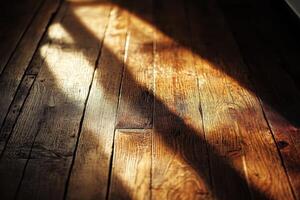 Sunlight streams across old wooden floorboards creating light and shadow photo