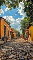Cobblestone street lined with colorful buildings under a cloudy sky photo
