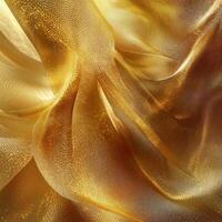 Lustrous golden fabric drapes elegantly with shimmering and flowing textures photo