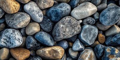 A collection of smoothed pebbles and stones close together photo