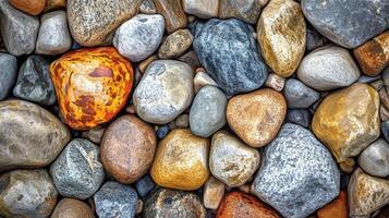 Polished stones and pebbles with varying shapes and colors photo