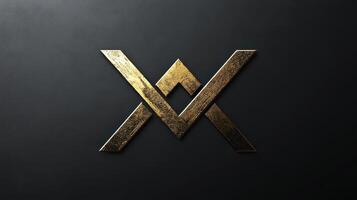 Luxurious gold emblem on a dark textured background is displayed photo