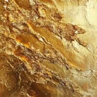 Highly textured gold leaf surface creates a dazzling abstract pattern photo