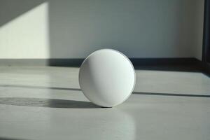 A white egg sitting on a floor in a room photo