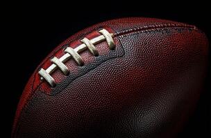 Close-up view of a textured football highlighting its unique stitching details photo