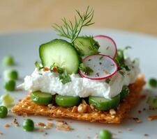 Fresh and vibrant appetizer with cucumbers, radishes, and herbs on a crunchy base photo