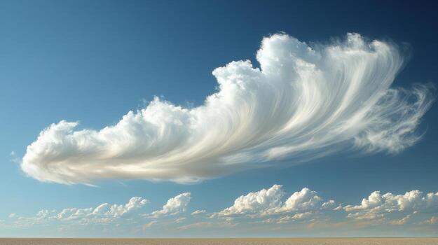 A large cloud is blowing in the sky photo