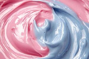 A close up of a blue and pink frosting photo
