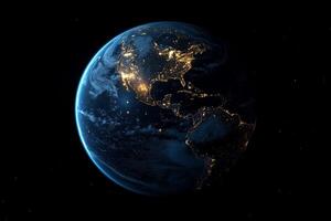 The earth at night with lights on photo