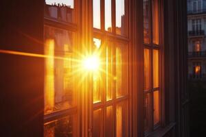The sun is shining through the window of a building photo
